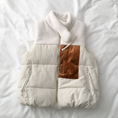 Casual γυναικείο γιλέκο με φερμουάρ και ψηλό γιακά σε λευκό και μαύρο χρώμα