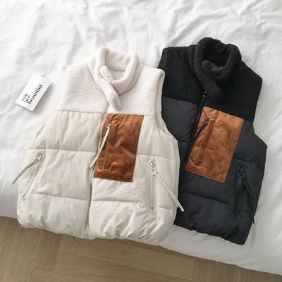 Casual γυναικείο γιλέκο με φερμουάρ και ψηλό γιακά σε λευκό και μαύρο χρώμα