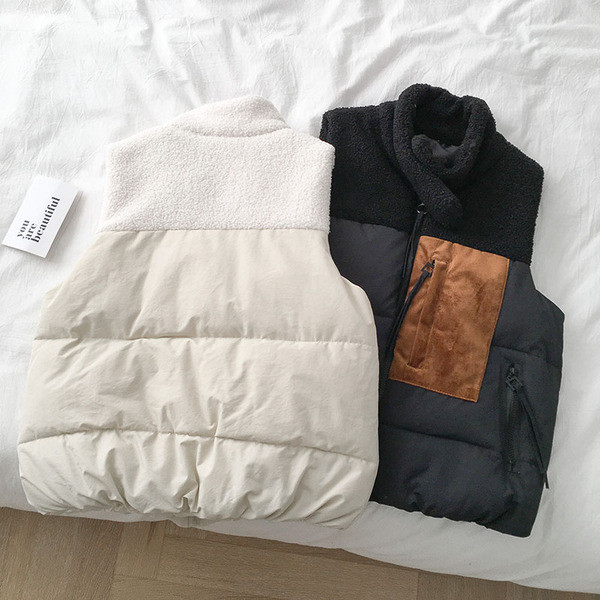 Casual γυναικείο γιλέκο με φερμουάρ και ψηλό γιακά σε λευκό και μαύρο χρώμα