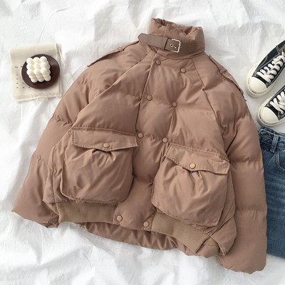 Női alkalmi kabát gombokkal és zsebbel barna és fekete színben