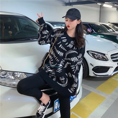 Női pulóver színes mintával két színben