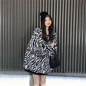 Μακρύ και φαρδύ χνουδοτό πουλόβερ