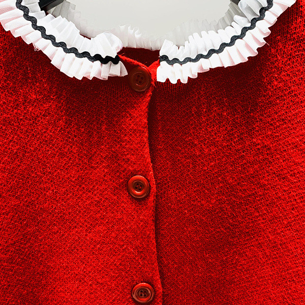 Vesta moderna de dama cu nasturi in negru, rosu si verde