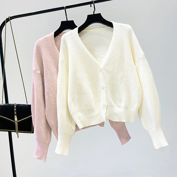 Vestă modernă de damă cu nasturi și decolteu spitz în alb, roz și albastru