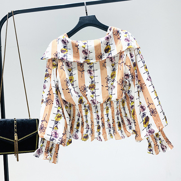 Új modell női blúz virágmintával és spitz nyakkivágással fehér, sárga és zöld színekben