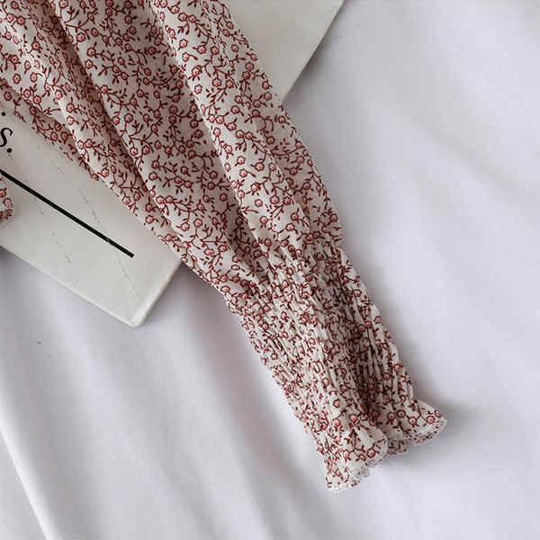 Stílusos női blúz spitz nyakkivágással és több színben megkötővel