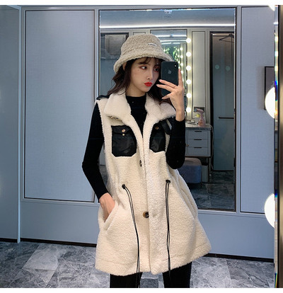 Μακρύ χνουδωτό γιλέκο με τσέπες και κορδόνια