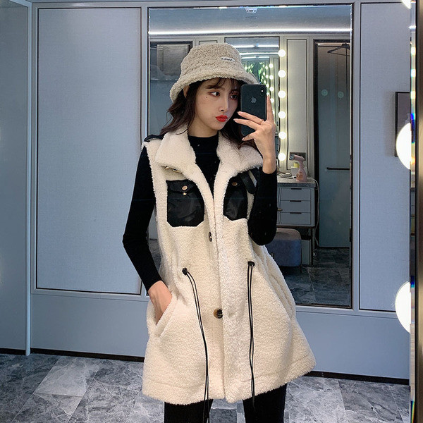 Μακρύ χνουδωτό γιλέκο με τσέπες και κορδόνια