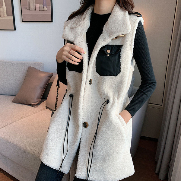 Μακρύ χνουδωτό γιλέκο με τσέπες και κορδόνια