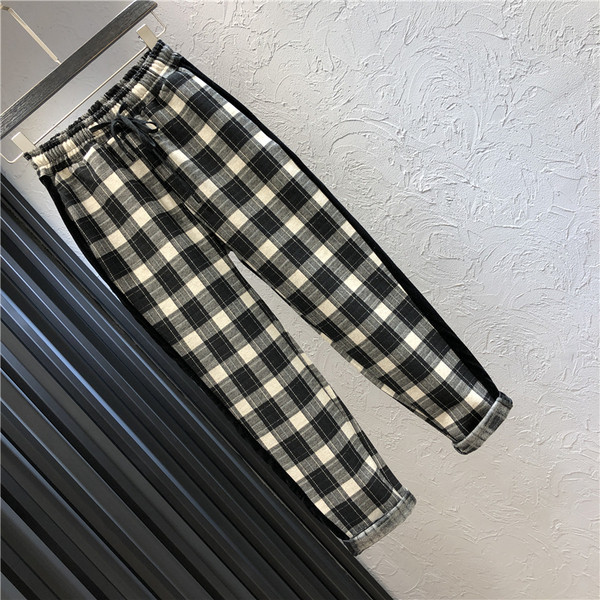 Pantaloni casual de dama in carouri cu talie inalta si margini