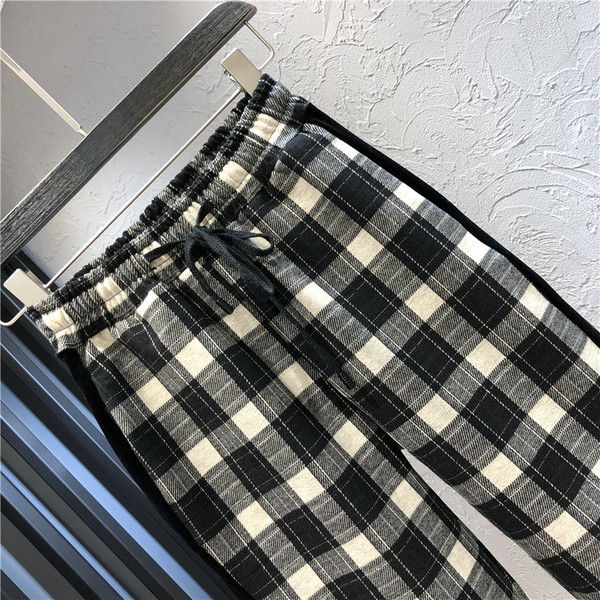 Pantaloni casual de dama in carouri cu talie inalta si margini