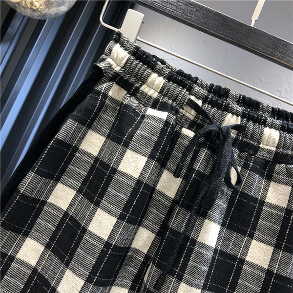 Pantaloni casual de dama in carouri cu talie inalta si margini