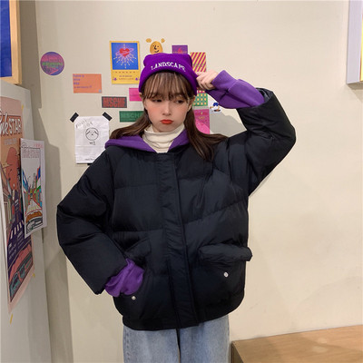 Rövid téli kabát fekete és sárga zsebekkel