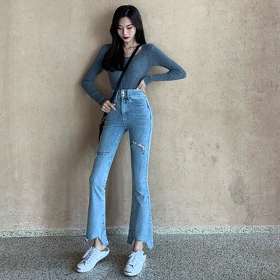 Blugi lungi asimetrici cu motive rupte in albastru