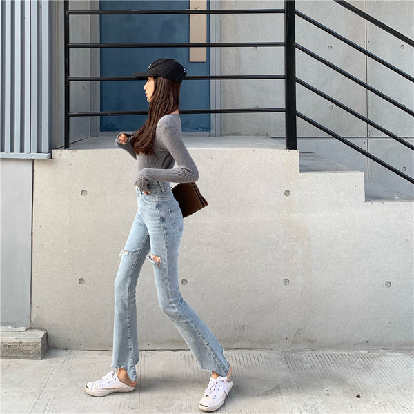 Blugi lungi asimetrici cu motive rupte in albastru