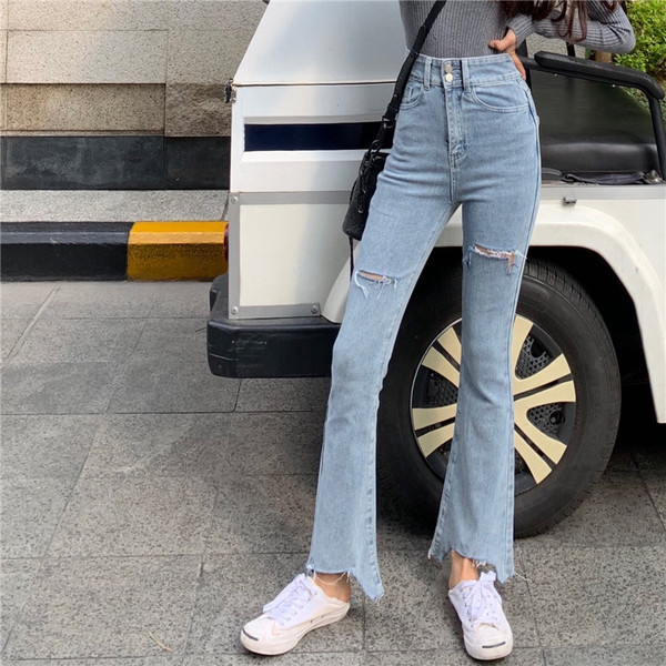 Blugi lungi asimetrici cu motive rupte in albastru