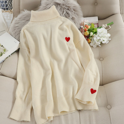 Női pulóver magas gallérral több színben