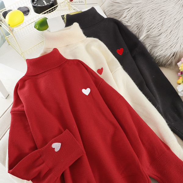 Női pulóver magas gallérral több színben