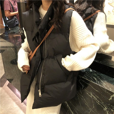 Vesta de dama alb si negru cu fermoar si buzunare