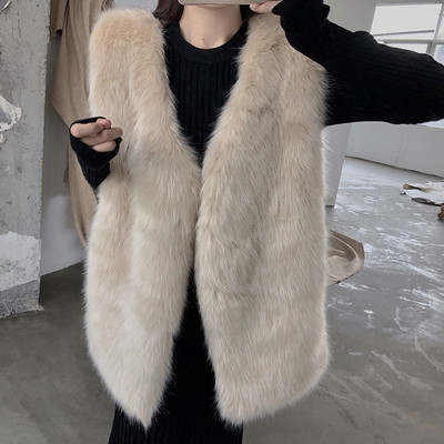 Vesta lunga din par artificial de culoare bej