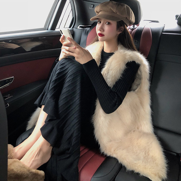 Vesta lunga din par artificial de culoare bej