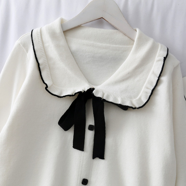 Pulover casual de dama cu panglica si nasturi in alb, negru si maro