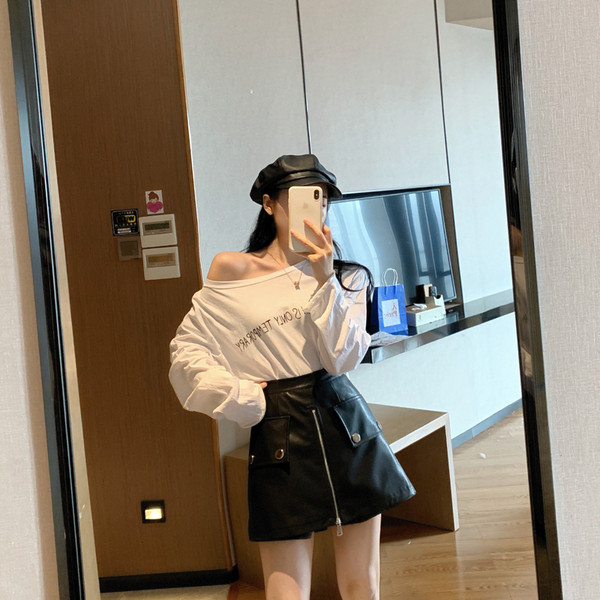 Κοντύ φούστα- παντελόνι  με φερμουάρ σε μαύρο και άσπρο χρώμα