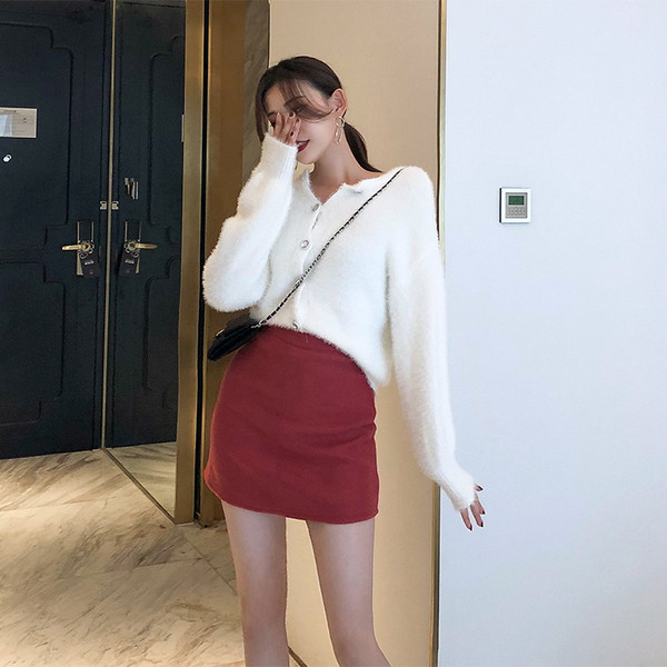 Rövid pehelymellény gombokkal, három színben