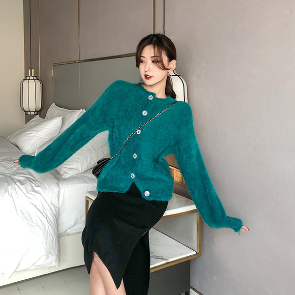 Rövid pehelymellény gombokkal, három színben