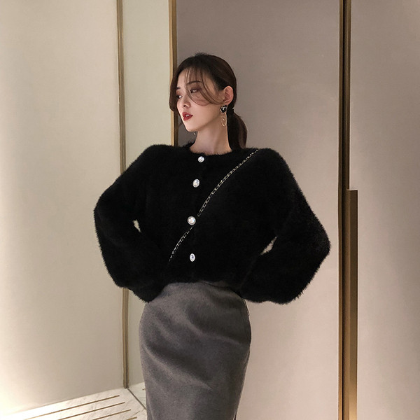 Rövid pehelymellény gombokkal, három színben