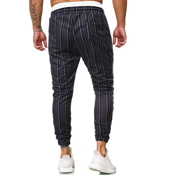 Pantaloni bărbați în dungi cu elastic în negru