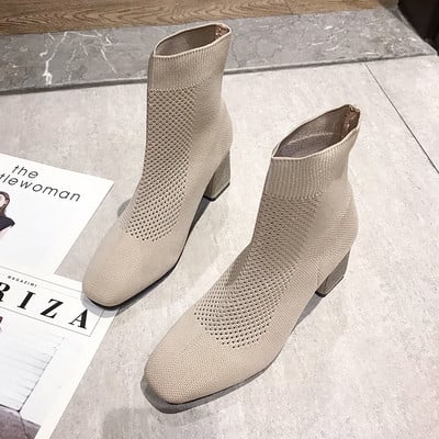 Γυναικείες μπότες με τακούνι σε μαύρο και μπεζ χρώμα