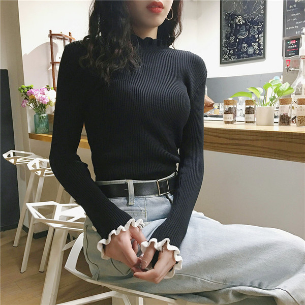 Pulover de damă tricotat subțire cu nasturi