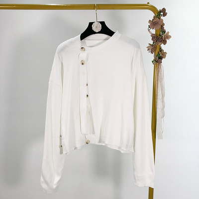 Női alkalmi mellény aszimmetrikus rögzítéssel több színben