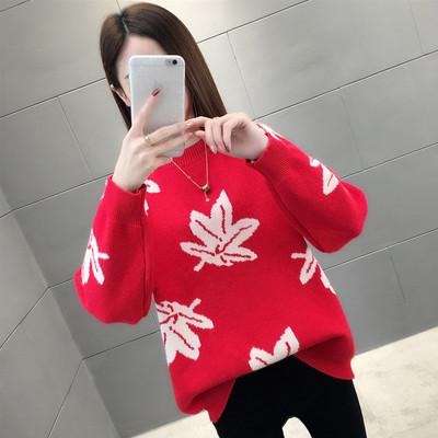 Stílusos női téli pulóver fehér és piros hímzéssel