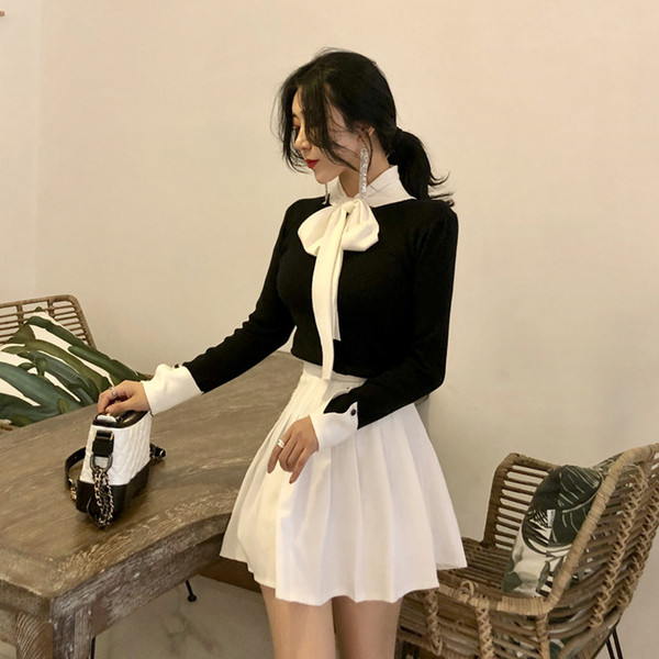 Bluza de dama eleganta cu panglica pe decolteu in alb si negru