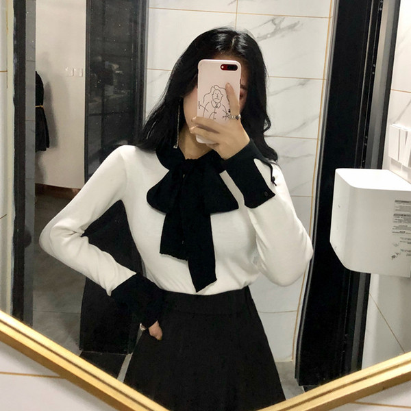 Bluza de dama eleganta cu panglica pe decolteu in alb si negru