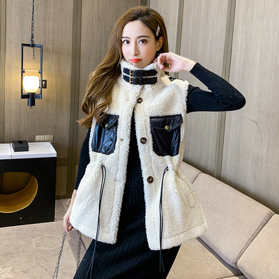 Aktuális női mellény gombokkal és zsebekkel fehér és barna színben