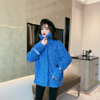 Γυναικείο χνουδωτό μπουφάν  σε οικολογικό δερμάτινα  στοιχεία σε λευκό και μπλε χρώμα