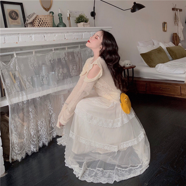 Pulover de dama din tricotat subtire cu umerii goi