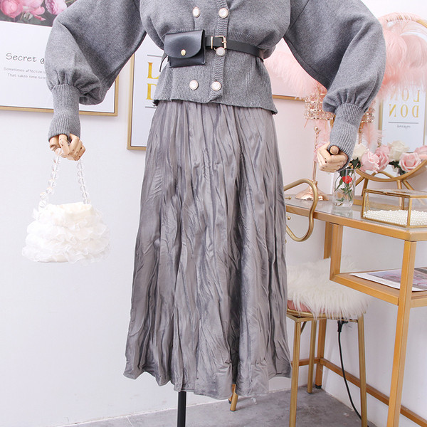 Κορυφαία γυναικεία φούστα σε καφέ, γκρι, μαύρο, πράσινο και μπεζ χρώα