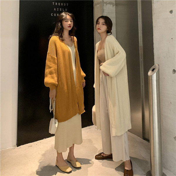 Vestă lungă de culoare bej și maro fără închidere