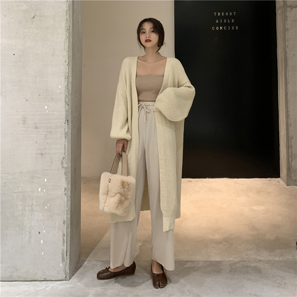 Vestă lungă de culoare bej și maro fără închidere