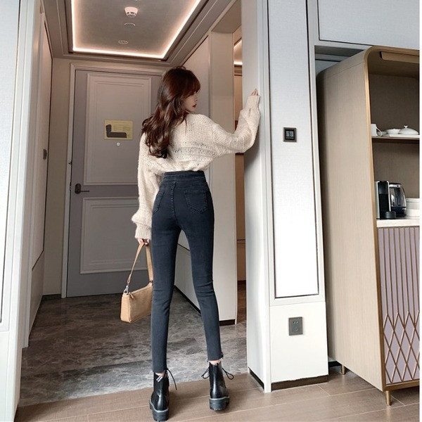 Blugi lungi de culoare neagră, cu închidere asimetrică