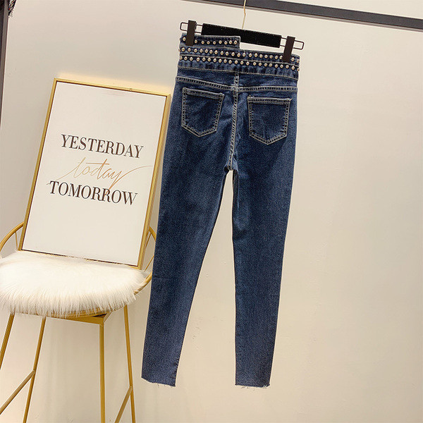 Blugi de damă cu talie înaltă și ochiuri în albastru și gri