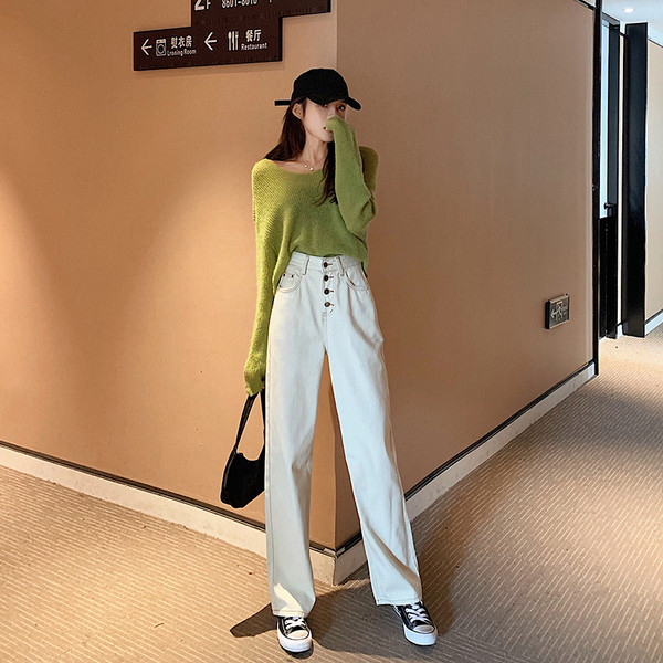 Női hosszú és széles farmer, világos színű gombokkal