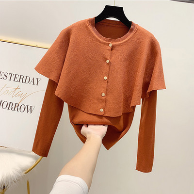 Női blúz fekete és barna gombokkal