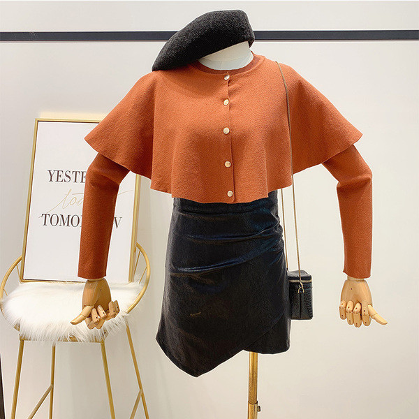 Női blúz fekete és barna gombokkal