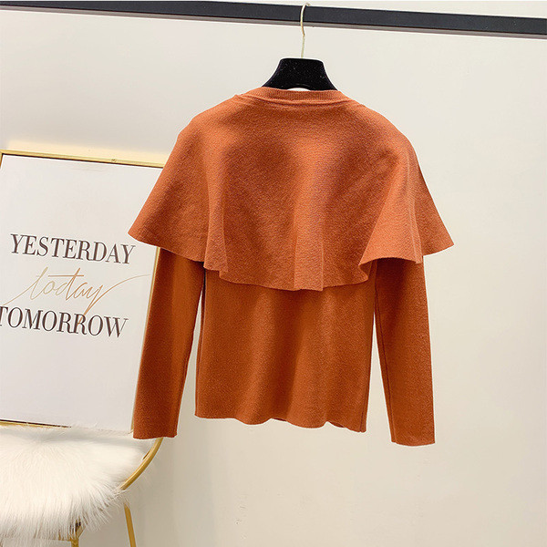 Női blúz fekete és barna gombokkal