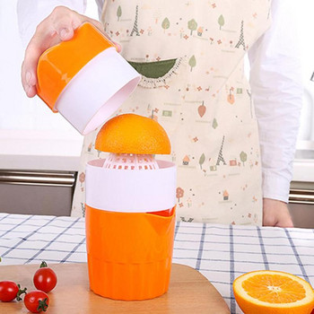 Ръчна сокоизтисквачка за цитрусови плодове в оранжев цвят